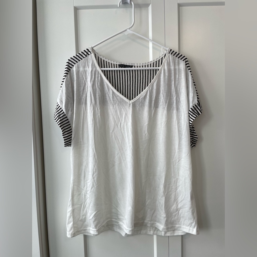 Iight weight v neck shirt with black and white stripe detail
